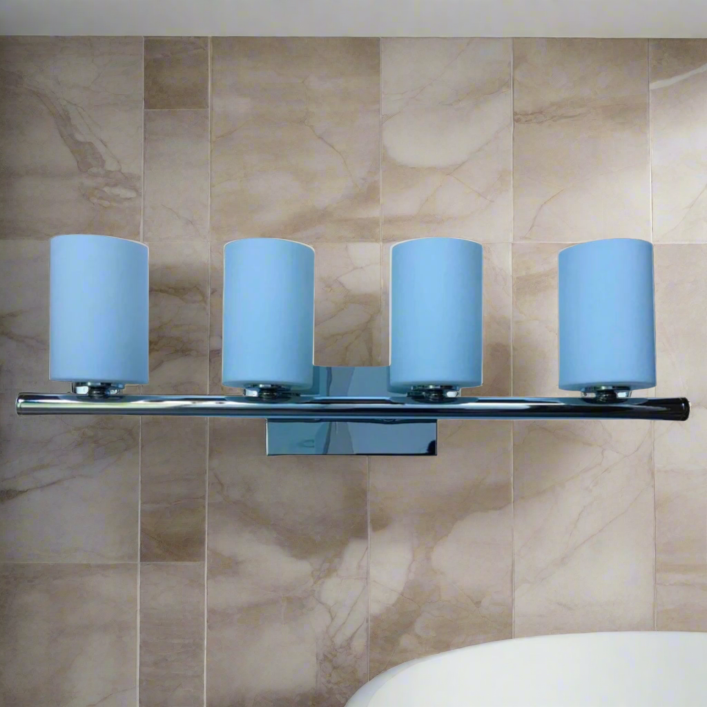 Wall mount light fixture with four blue cylindrical opal glass shades, polished chrome finish, mounted on a bathroom wall.